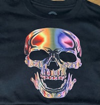 a black t - shirt with a rainbow skull on it