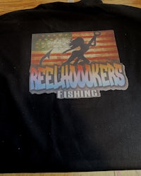 a man wearing a black t - shirt that says south carolina fishing