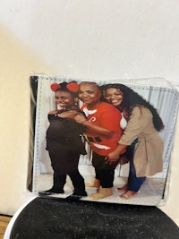 a wallet with a picture of a family in it