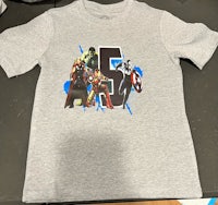 a gray t - shirt with avengers characters on it