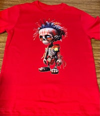 a red t - shirt with a skeleton on it